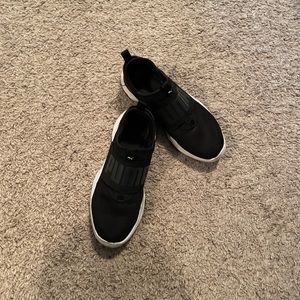 Black Puma sneakers